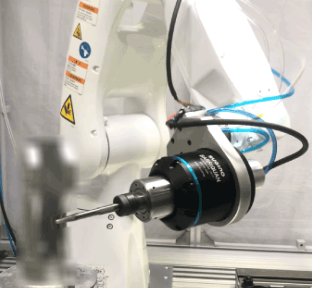 Sugino's Barriquan deburring tool holder and spindle is attached to a light payload robot to automate the deburring process